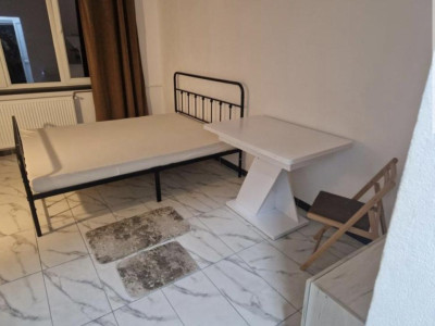 Garsoniera de vanzare etaj 2 zona Troianu Ramnicu Valcea